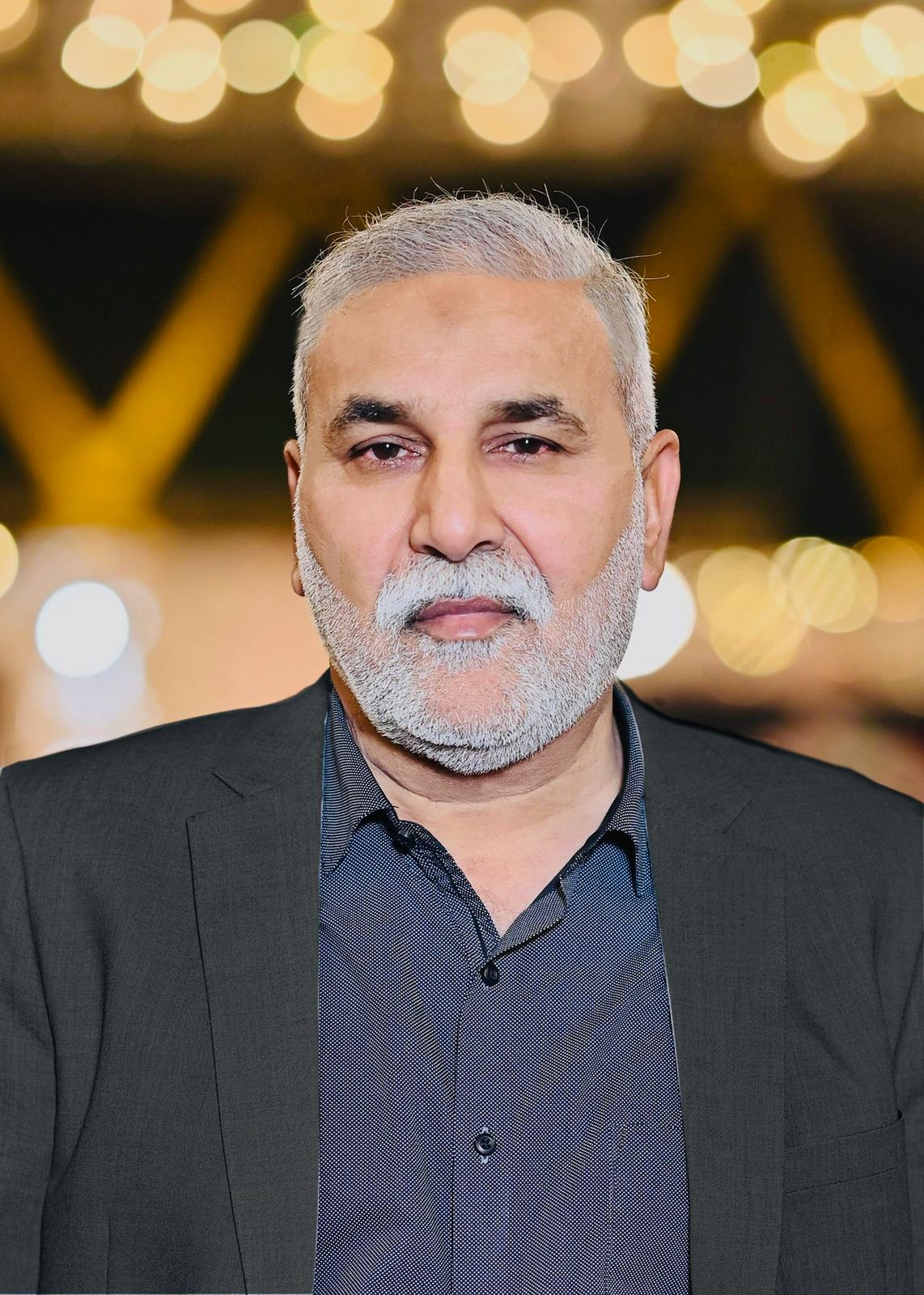 Mian Maqsood-ul-Hassan - Chairman, Board of Trustees
